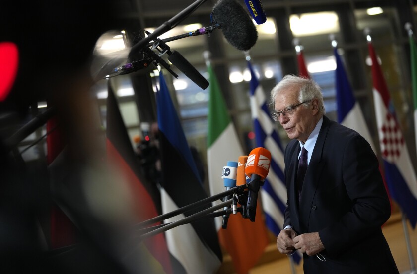 European Union foreign policy chief Josep Borrell speaks with the media as he arrives for a meeting of EU foreign ministers at the European Council building in Brussels on Monday, Dec. 13, 2021. European Union foreign ministers met Monday to discuss how to thwart the threat of a possible new Russian invasion of Ukraine and what measures to take should Moscow decide to send its troops across the border. (AP Photo/Virginia Mayo)