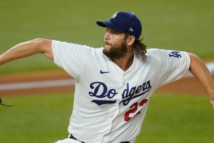 Los Angeles Dodgers starting pitcher Clayton Kershaw delivers during the first inning in Game 2 of a baseball National League Division Series Wednesday, Oct. 7, 2020, in Arlington, Texas. (AP Photo/Sue Ogrocki)