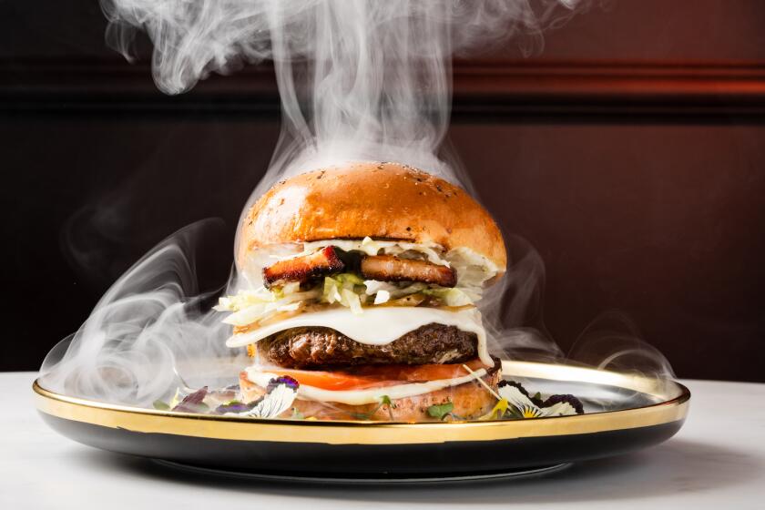 The Smoke Show burger at Bun & Patti restaurant in Little Italy.