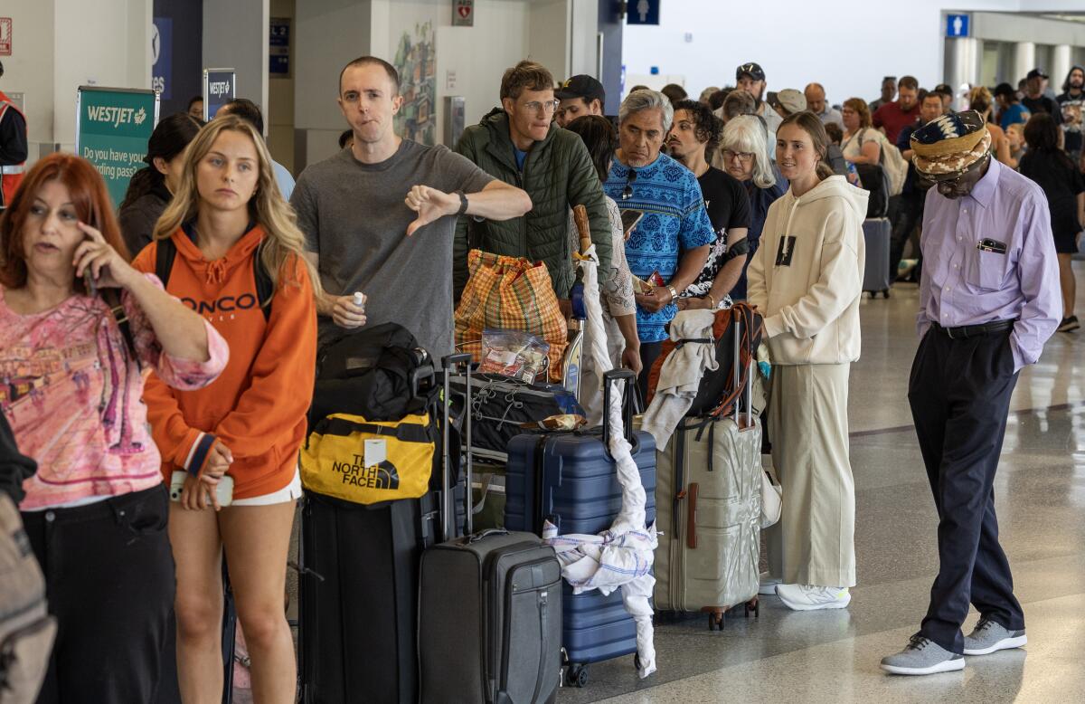 A line of passengers at Los Angeles International Airport.