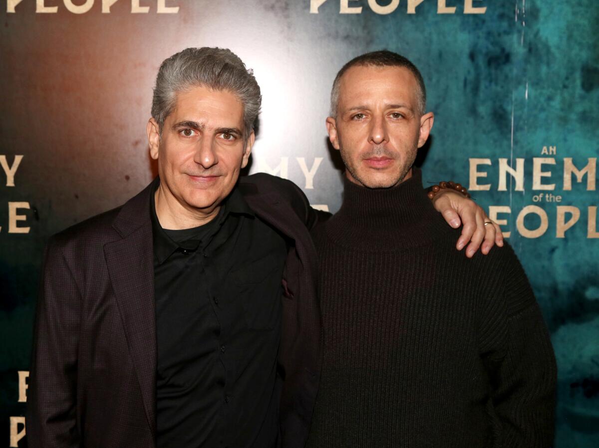 Michael Imperioli with his arm around the shoulder of Jeremy Strong, both in black sweaters