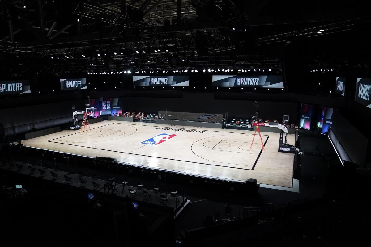 NBA basketball arenas are empty at Walt Disney World on Friday.