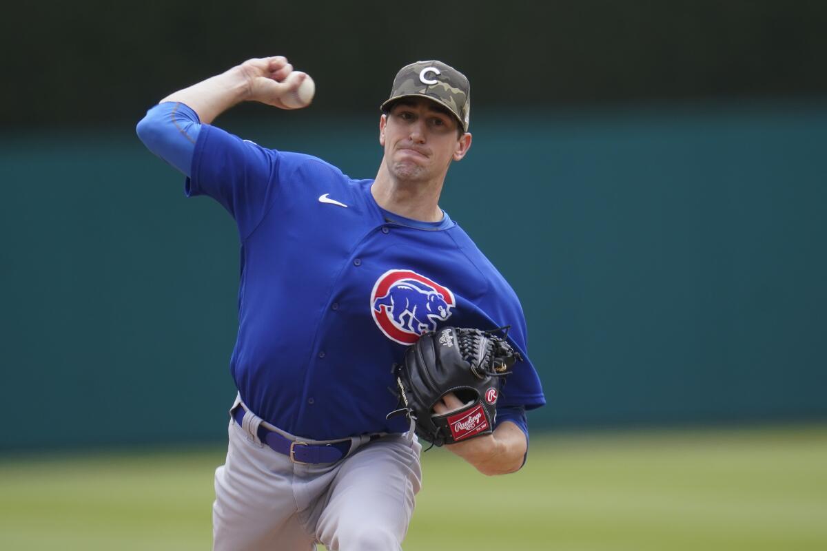 Chicago Cubs pitcher Kyle Hendricks throws against the Detroit Tigers in the first inning of a baseball game in Detroit, Sunday, May 16, 2021. (AP Photo/Paul Sancya)
