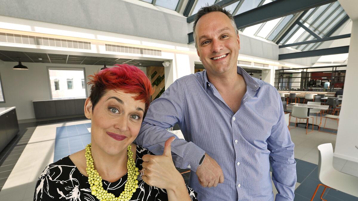 Rotten Tomatoes vice president Jeff Voris, right, and senior editor Grae Drake at their Beverly Hills offices. (Al Seib / Los Angeles Times)