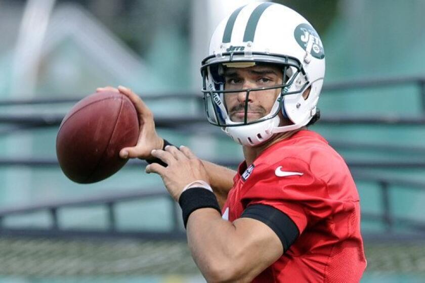 Jets quarterback Mark Sanchez takes part in a passing drill last week at training camp in Cortland, N.Y.