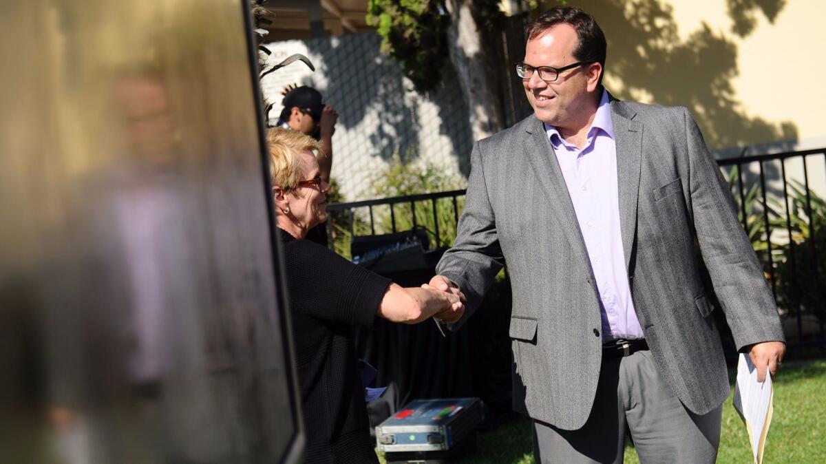 Alex Caputo-Pearl, shown after a previous union news conference, won reelection Monday as president of United Teachers Los Angeles.