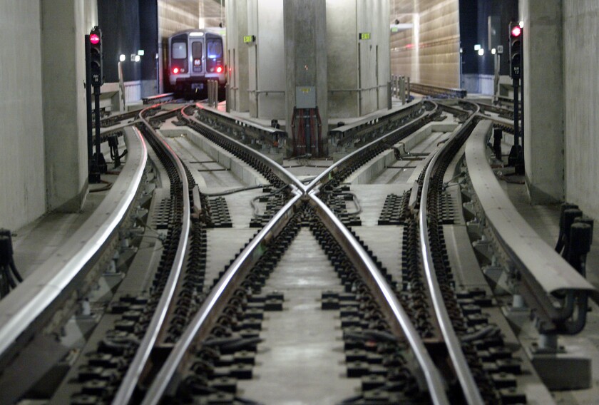 Tail tracks (far left and far right) and pocket (center rails) at the end of the line in the North Hollywood Station in 2003.