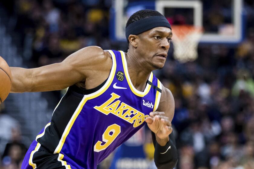 Los Angeles Lakers guard Rajon Rondo (9) dribbles against the Golden State Warriors.