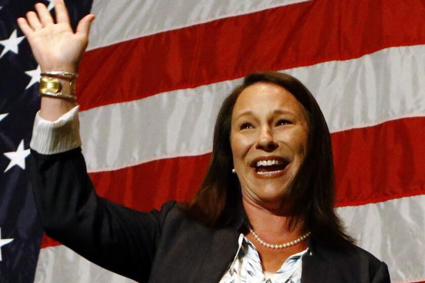Alabama Rep. Martha Roby waves to supporters during the watch party as she wins the runoff election, Tuesday, July 17, 2018, in Montgomery, Ala. Roby won Alabama's Republican runoff on Tuesday, fighting through lingering fallout from her years-old criticism of then-candidate Donald Trump in a midterm contest that hinged on loyalty to the GOP president.. (AP Photo/Butch Dill)