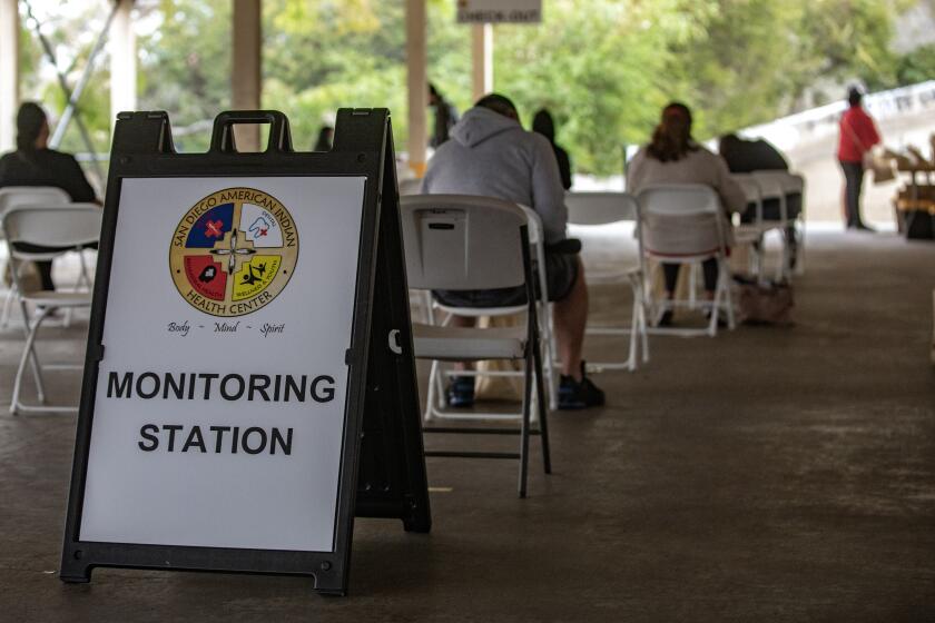 SAN DIEGO, CA - MARCH 03: Patients are monitored for 15 minutes after receiving coronavirus vaccinations at The American Indian Health Center on Wednesday, March 3, 2021 in San Diego, CA. (Jarrod Valliere / The San Diego Union-Tribune)
