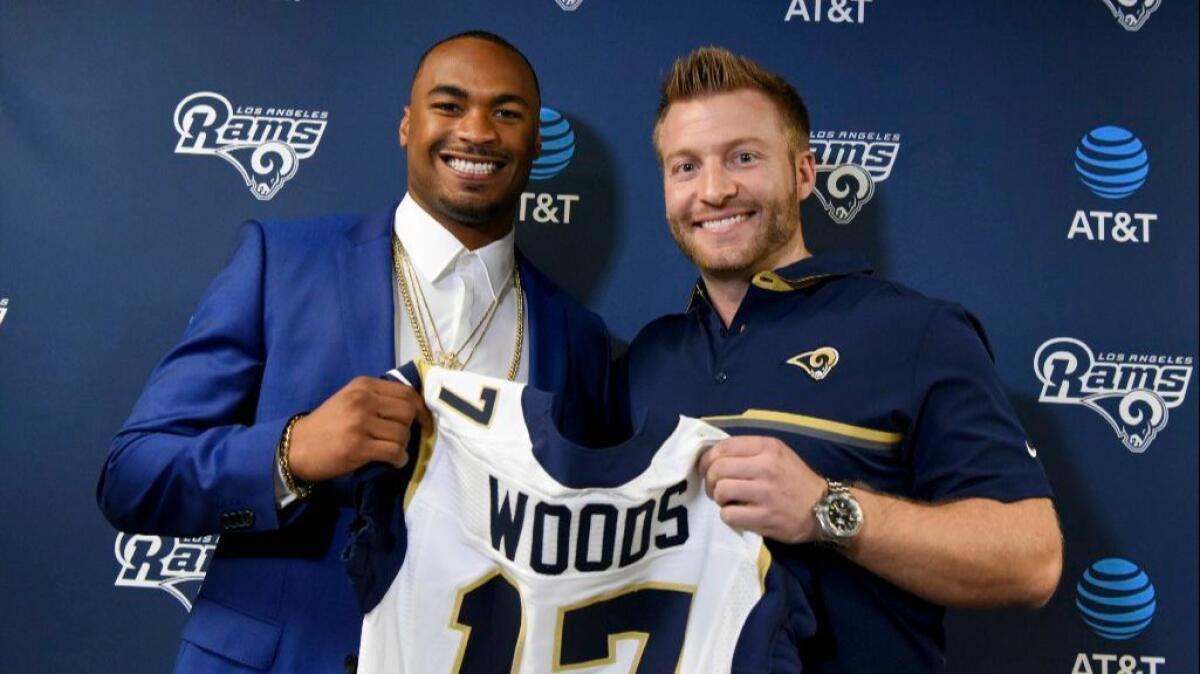 Rams receiver Robert Woods poses with Coach Sean McVay during his introductory news conference on March 10.