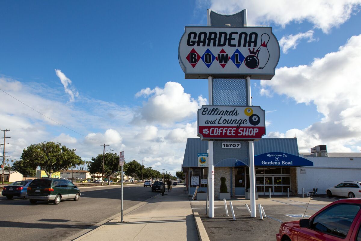 Exterior of Gardena Bowl with large sign on Vermont Avenue.