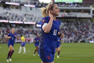 United States' Lindsey Horan (10) celebrates after scoring a goal during the first half.