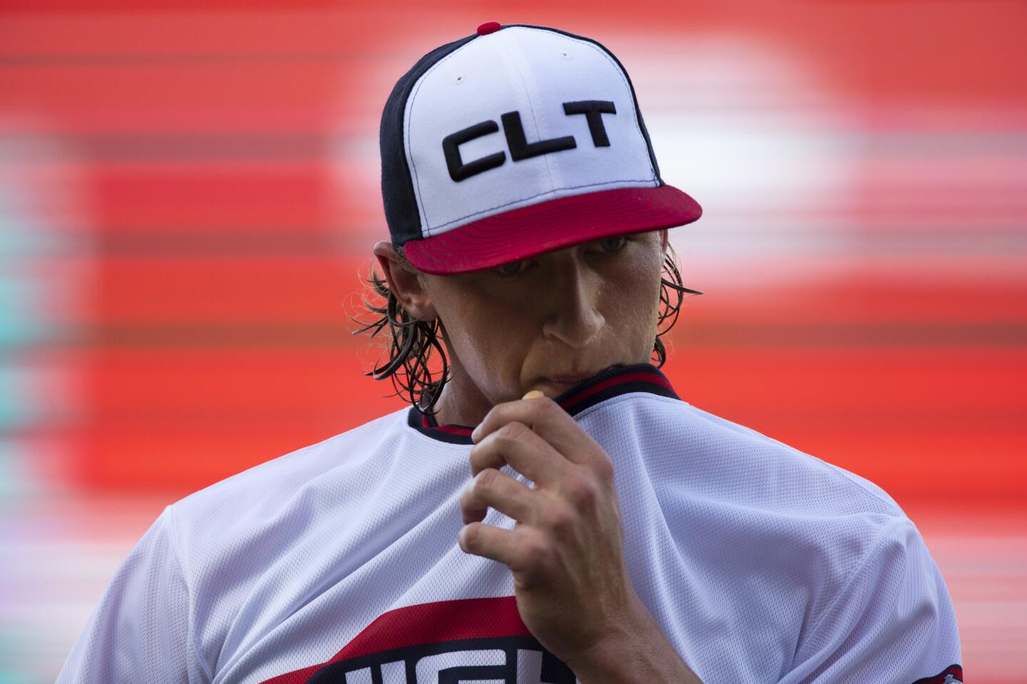 Charlotte Knights pitcher Michael Kopech walks to the dugout after the first inning of a game against Norfolk on Wednesday, March 23, 2018, in Charlotte, N.C.