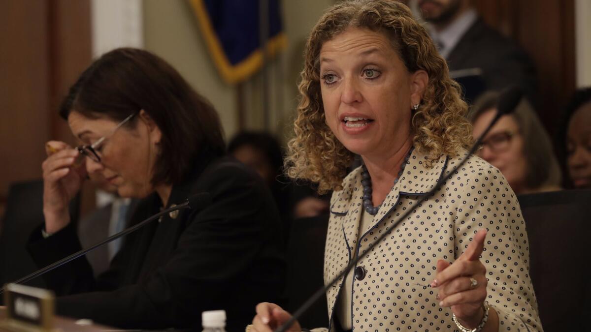 Rep. Debbie Wasserman Shultz (D-Fla.) has fired an information technology staffer who was arrested on a federal bank fraud charge.