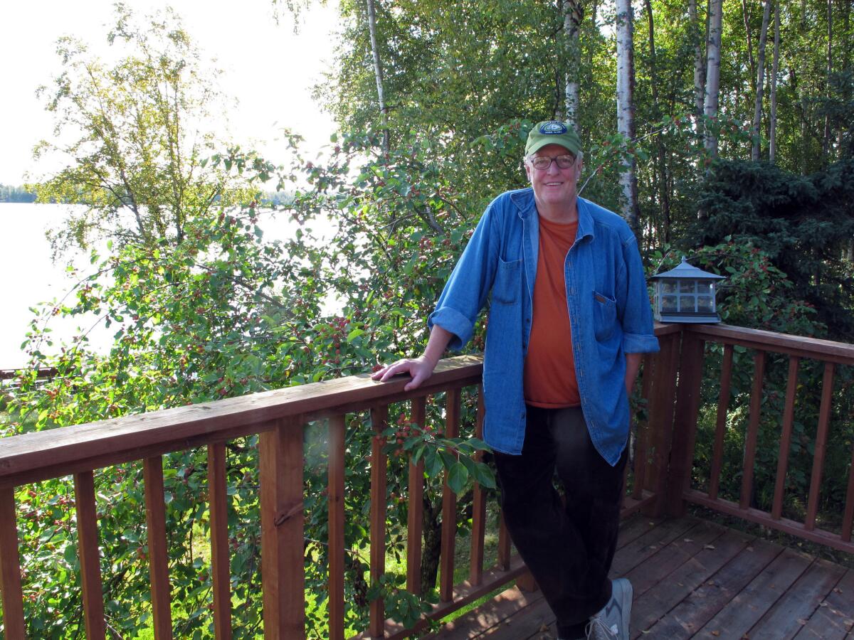 Author Joe McGinniss at the home he rented next door to Sarah Palin to write his book about her, "Going Rogue." McGinniss, the adventurous and newsmaking author, has died from complications of prostate cancer.