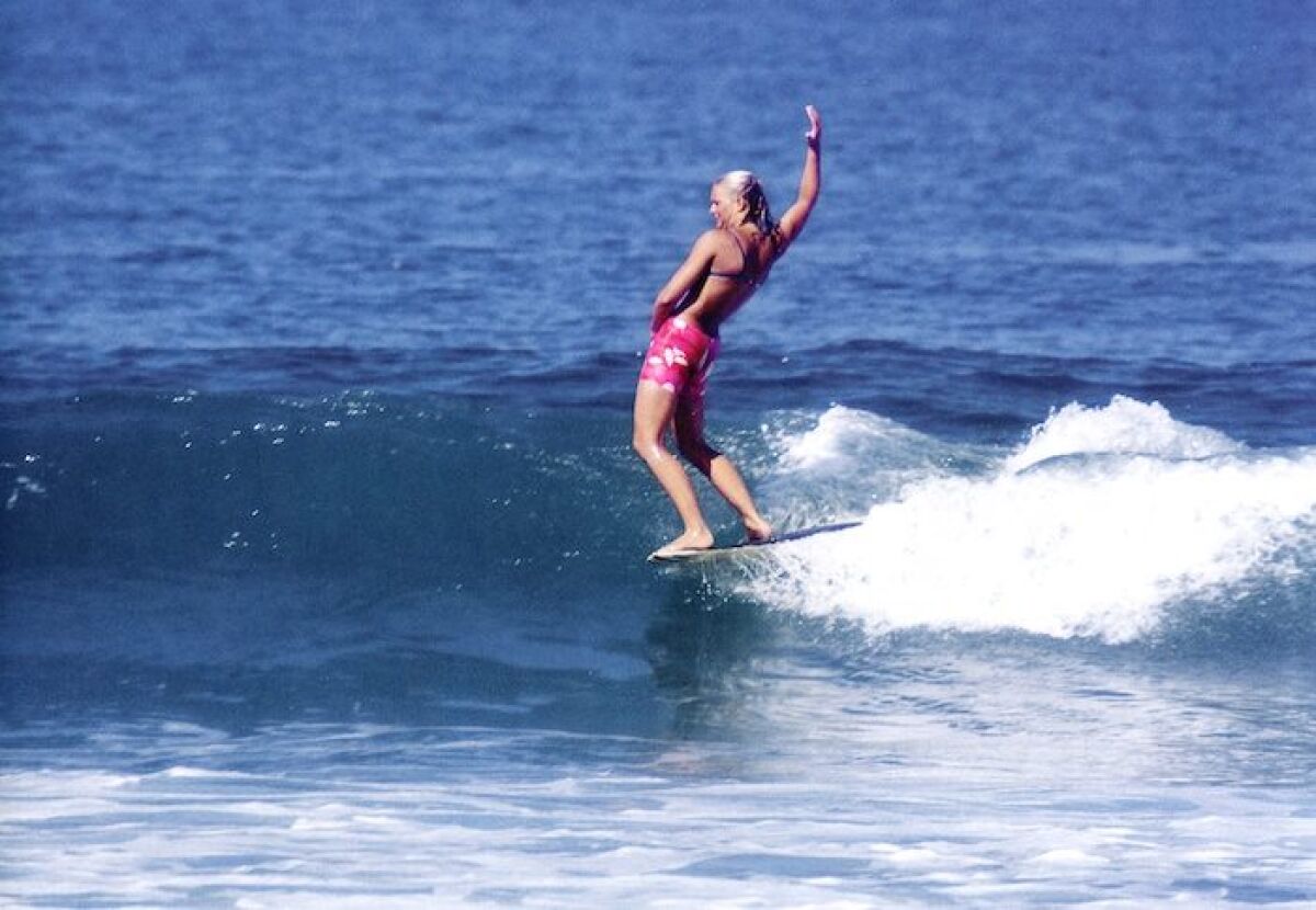 Joyce Hoffman wins her third straight world championship at the 1966 contest in Ocean Beach.