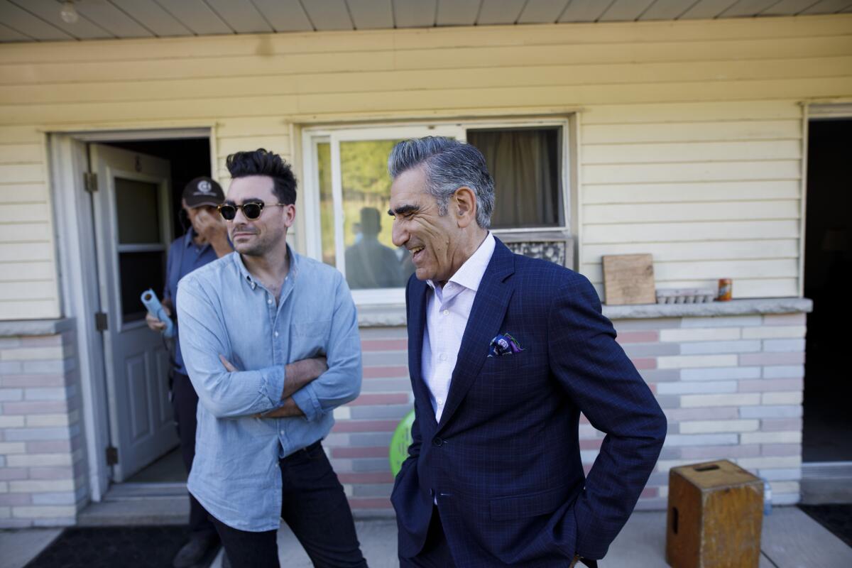 Father and son Dan Levy, left, and Eugene Levy on the "Schitt's Creek" set