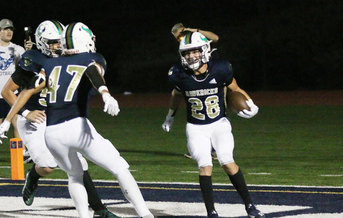 Junior running back Andrew Maes (#28) after scoring a TD against Vista.