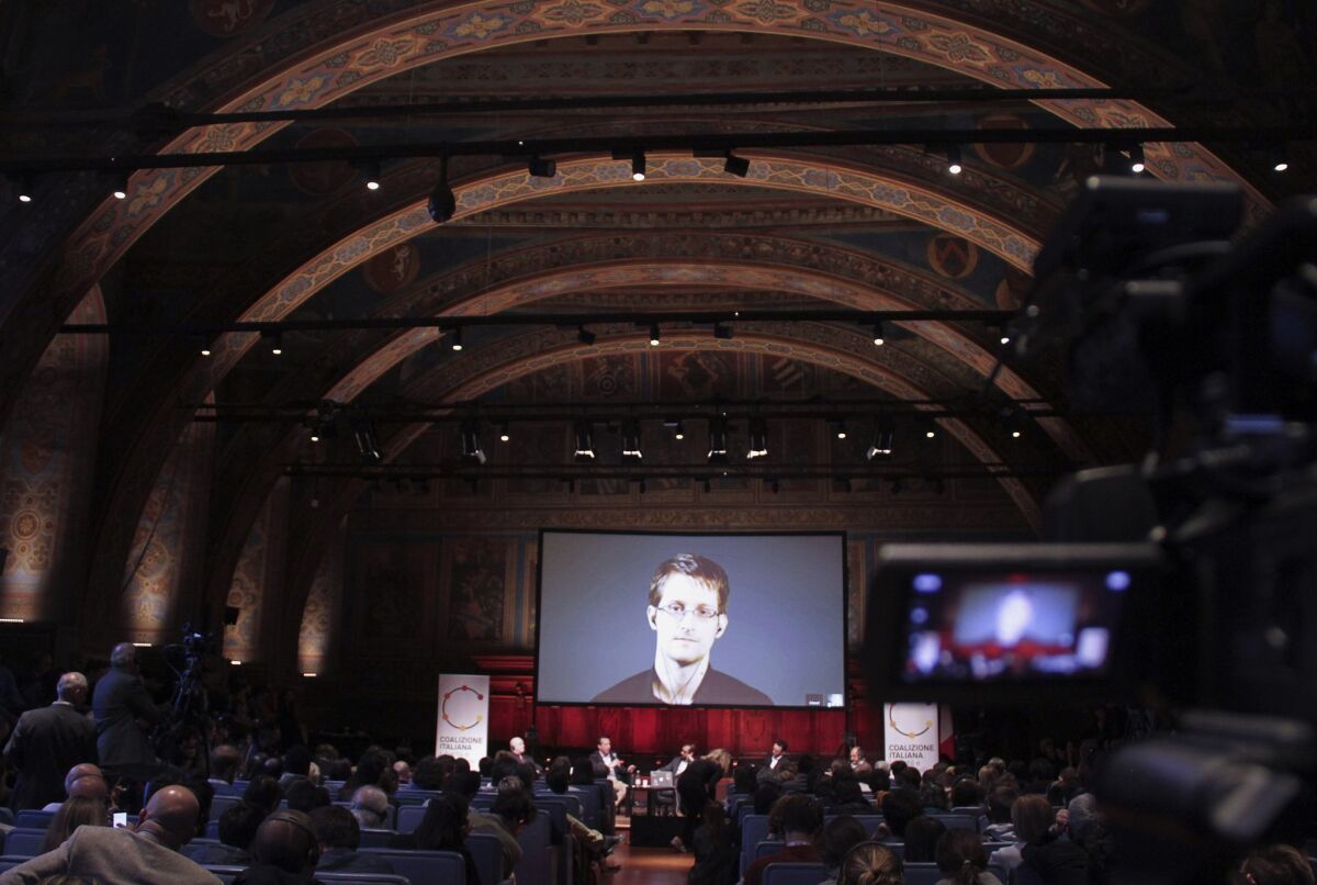 National Security Agency leaker Edward Snowden appears on a live video during the International Journalism Festival in Perugia, Italy, on April 17.
