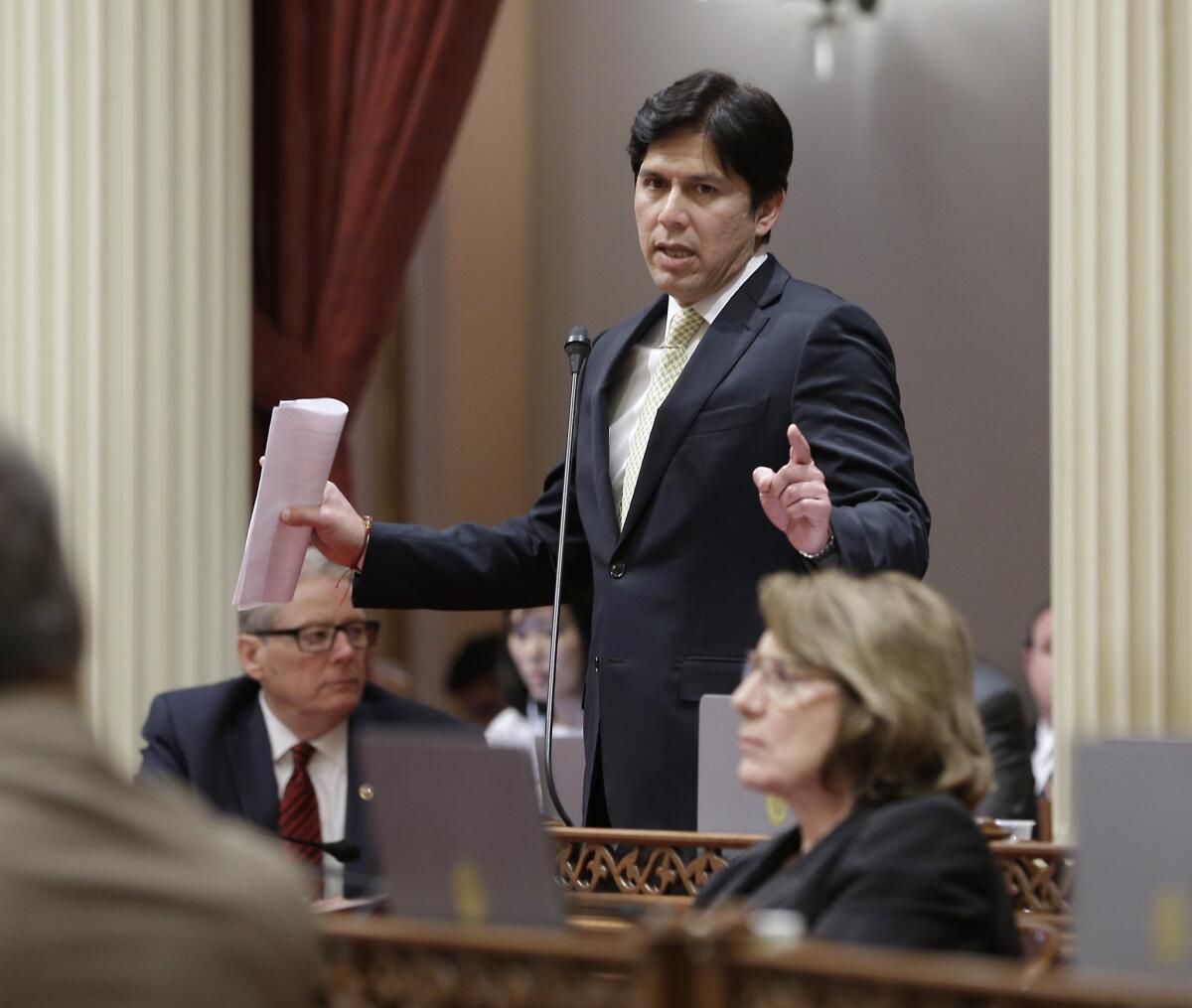 State Sen. President Pro Tem Kevin de León (D-Los Angeles) addresses the Senate. With the Legislature out of session, he is making multiple overseas trips.