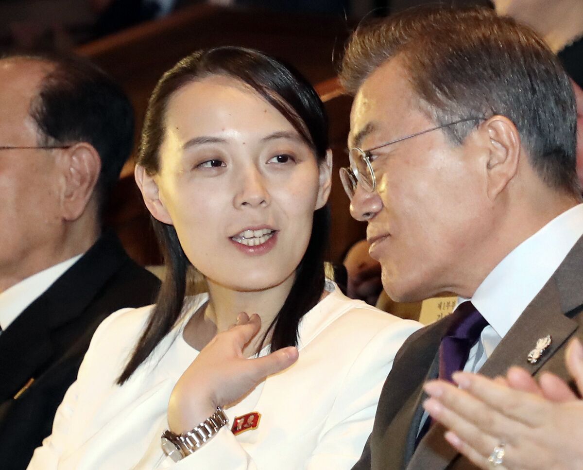 FILE - Kim Yo Jong, center, North Korean leader Kim Jong Un's sister, talks with South Koran President Moon Jae-in, right, as they watch a performance of North Korea's Samjiyon Orchestra at National Theater in Seoul, South Korea, on Feb. 11, 2018. For the second time in days, the powerful sister of North Korean leader Kim Jong Un berated South Korea for touting its supposed preemptive strike capabilities against the North, saying her country's nuclear forces would annihilate the South's conventional forces if provoked.(Bee Jae-man/Yonhap via AP, File)