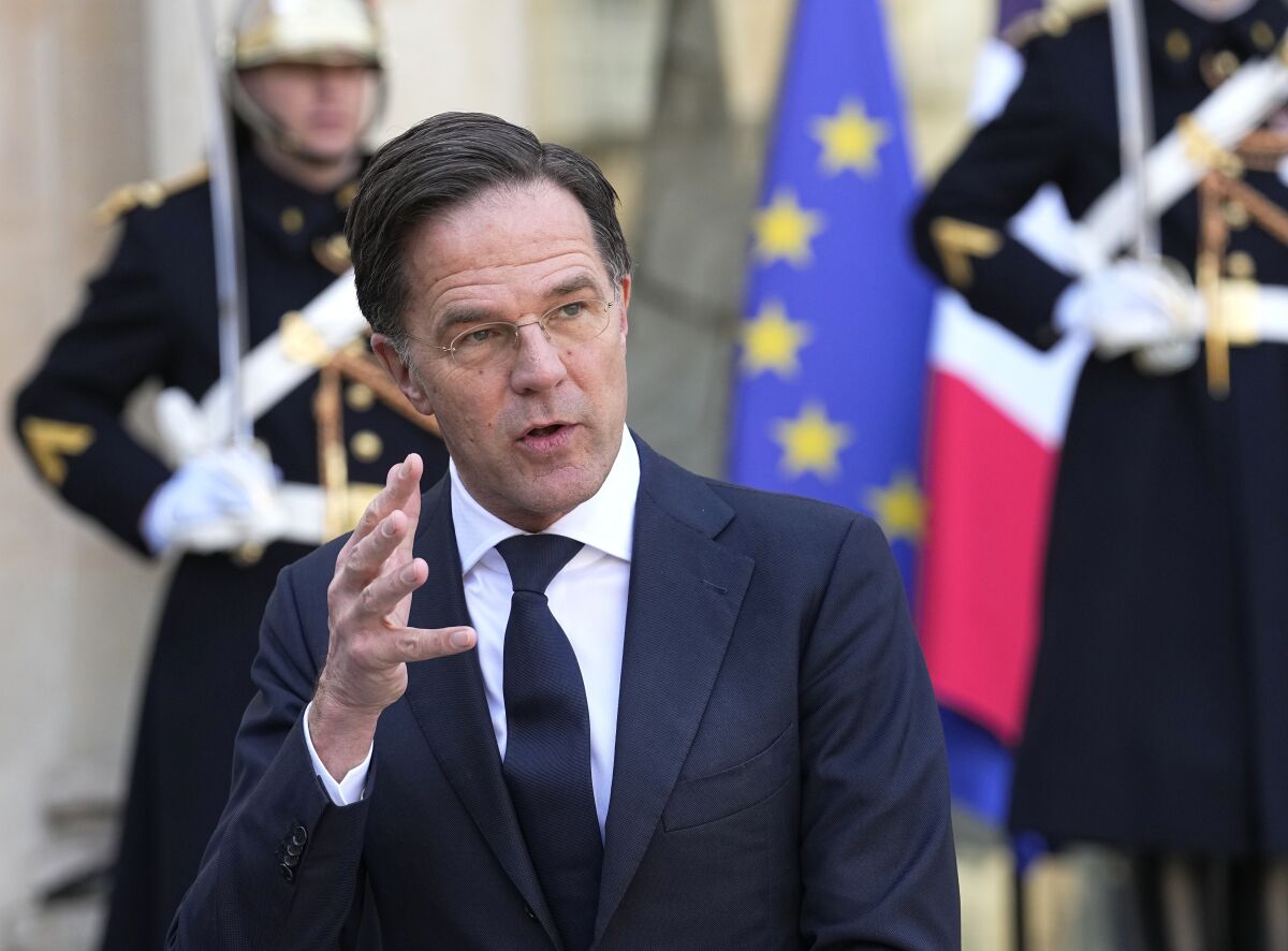 Netherlands Prime Minister Mark Rutte, gestures qs he steaks to the media before a meeting with French President Emmanuel Macron at the Elysee Palace in Paris, Wednesday, March 9, 2022. Netherlands Prime Minister Mark Rutte is for bileteral talks in Paris. (AP Photo/Michel Euler)