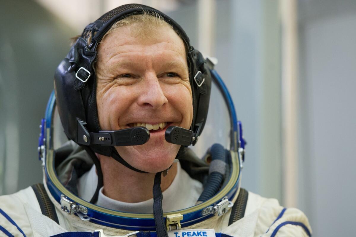 British astronaut Tim Peake smiles during training in Russia in November. He plans to run the London marathon -- while in the International Space Station.