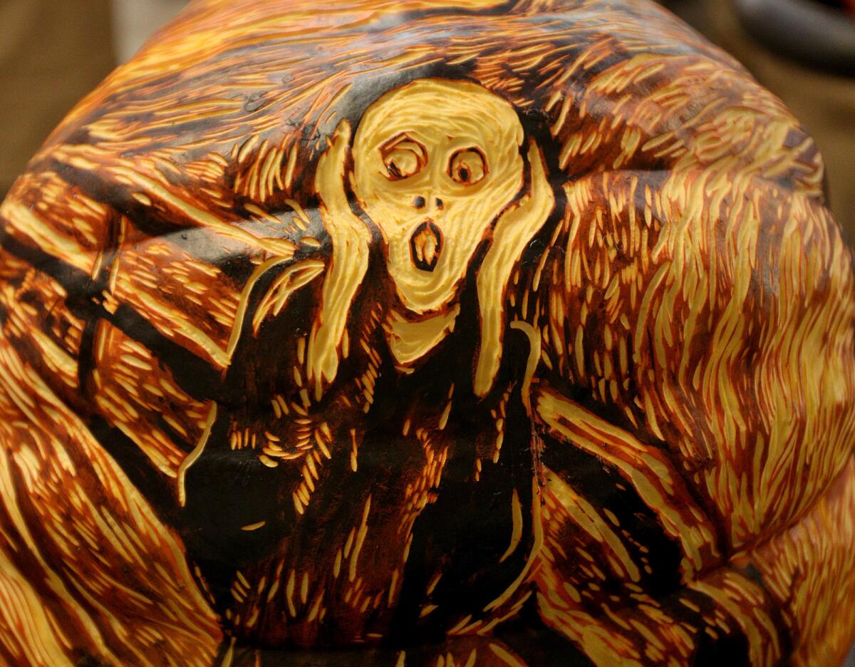 A pumpkin is carved to look like a famous work of art.