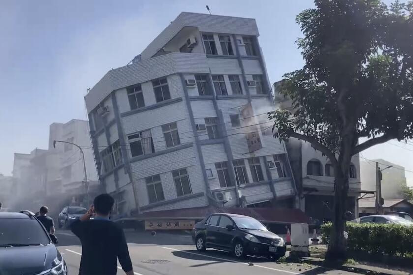 In this image taken from a video footage run by TVBS, a partially collapsed building is seen in Hualien, eastern Taiwan on Wednesday, April 3, 2024. A powerful earthquake rocked the entire island of Taiwan early Wednesday, collapsing buildings in a city and creating a tsunami that washed ashore on Japanese islands. (TVBS via AP)