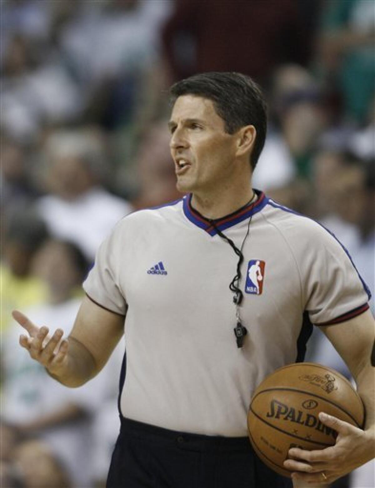 Referee Scott Foster makes a call during the second half of an NBA