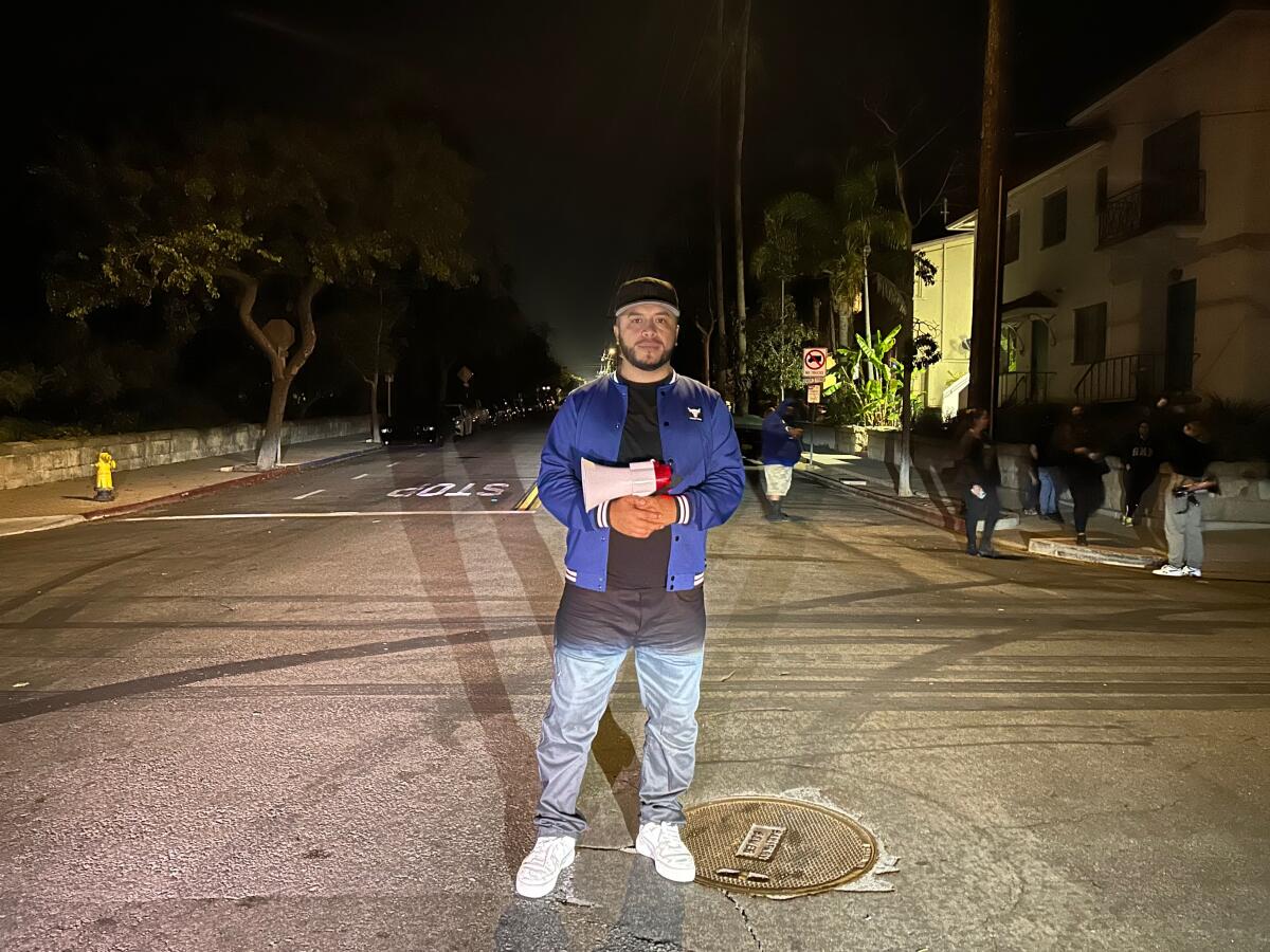 Man stands in an empty Santa Barbara intersection 