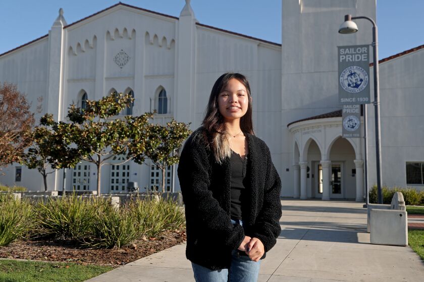 Joyce De Quiros, a Newport Harbor High School junior, won the Congressional App Challenge with her app, "ImpactO, which seeks to improve youth awareness of world events by connecting them with news and resources to get involved with issues they care about. (Kevin Chang / Daily Pilot)