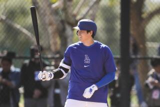 Dodgers designated hitter Shohei Ohtani participates in spring training workouts at Camelback Ranch in Phoenix.