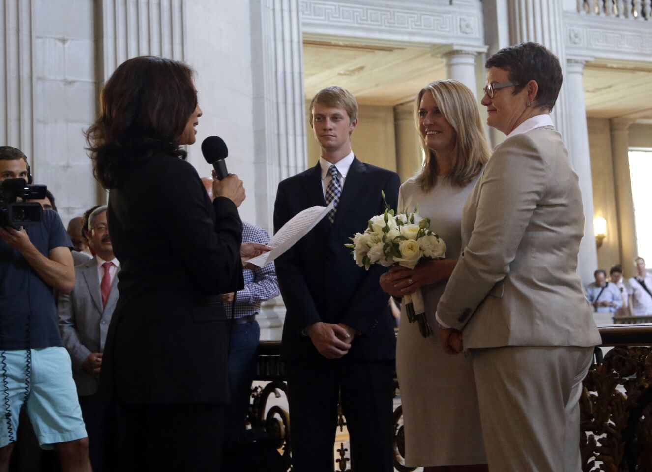June 28, 2013: Sandy Stier and Kris Perry exchange wedding vows in front of California Atty. Gen. Kamala Harris.