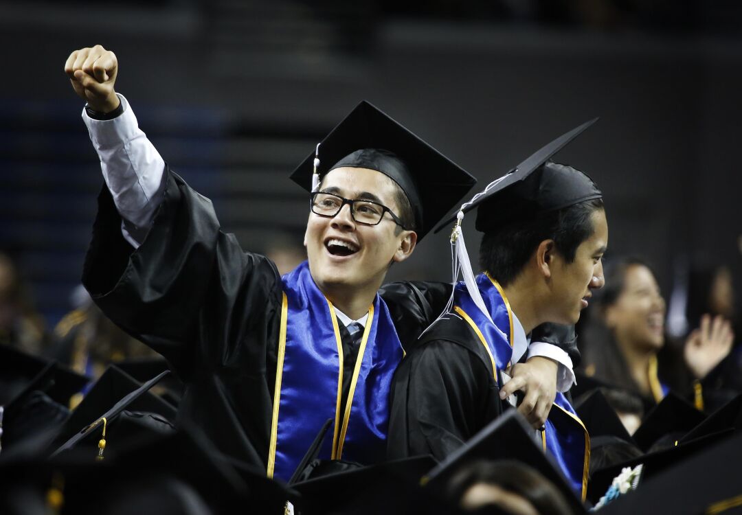 LOS ANGELES, CA June 7, 2016 UCLA 2016 grads celebrate during Commencement ceremonies help June 10, 2016 for the College of Letter and Science. UCLA College commencement ceremonies were held at 2 and 7 p.m with more than 5,000 graduating seniors at the Pauley Pavilion in Westwood Plaza. (Barbara Davidson / Los Angeles Times)
