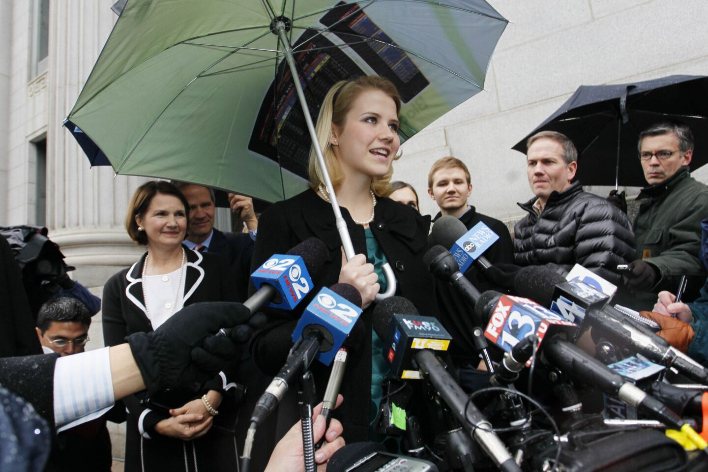 Elizabeth Smart addresses the media outside a federal courthouse following the guilty verdict in the Brian David Mitchell trail in Salt Lake City. Mitchell was found guilty in the June 5, 2002, kidnapping of Elizabeth Smart.
