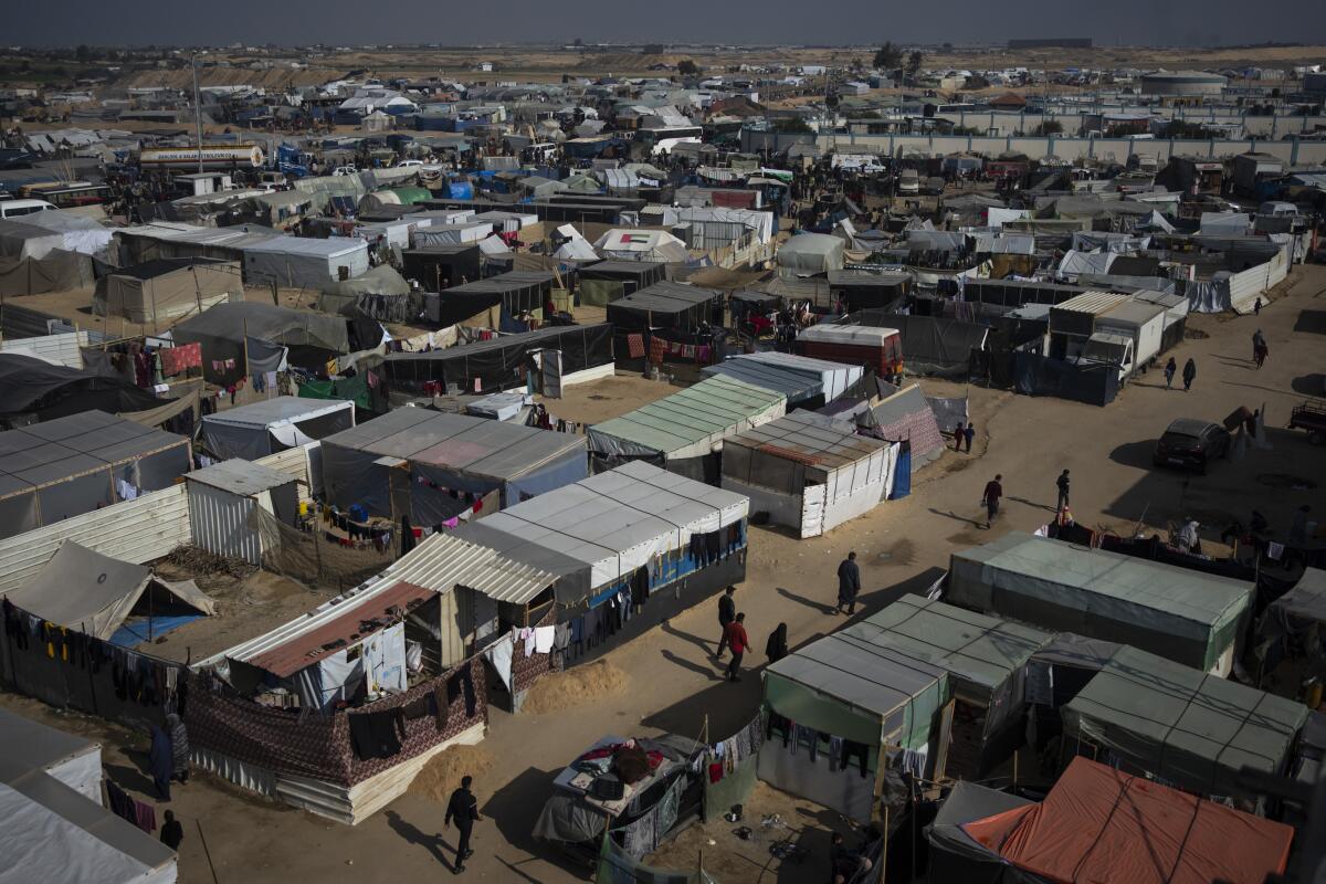 Makeshift tent camp where Palestinians displaced by Israeli attacks are staying, in the Muwasi area, southern Gaza.