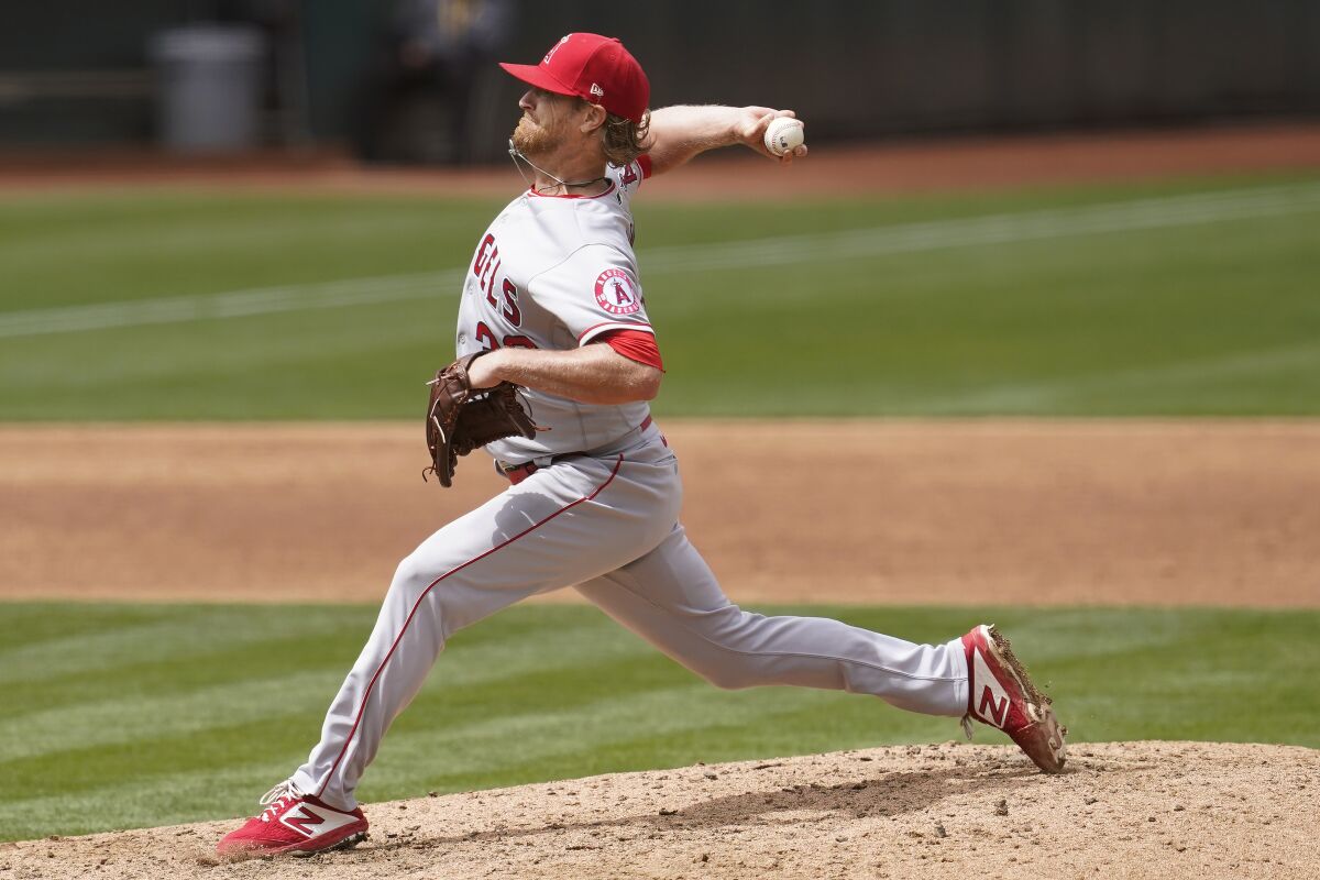 Los Angeles Angels' Alex Cobb pitches against the Oakland Athletics during the sixth inning.