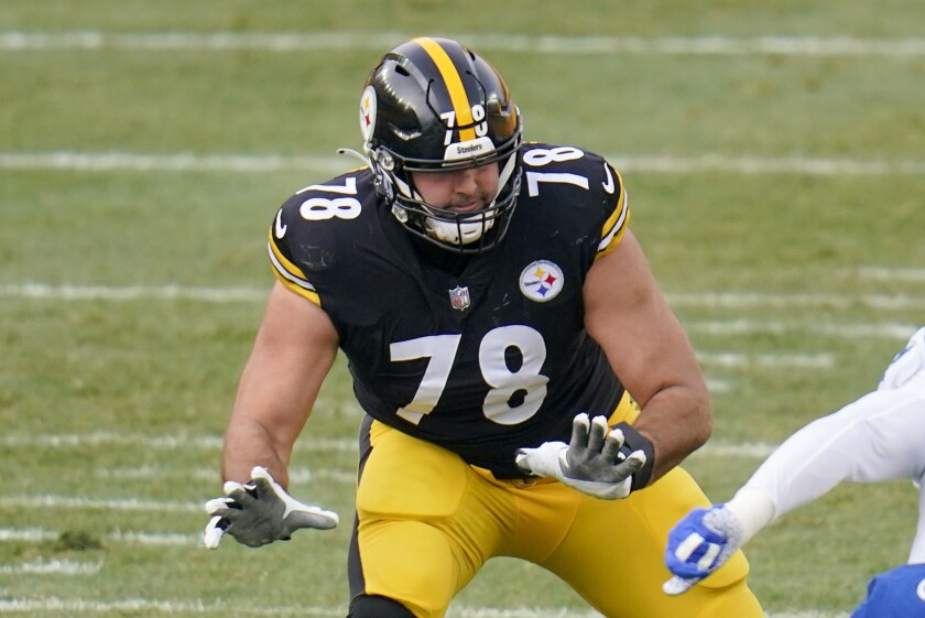 FILE - Pittsburgh Steelers offensive tackle Alejandro Villanueva (78) blocks during the first half of an NFL football game against the Indianapolis Colts in Pittsburgh, in this Sunday, Dec. 27, 2020, file photo. The Baltimore Ravens have signed two-time Pro Bowl tackle Alejandro Villanueva to a two-year deal, Tuesday, May 4, 2021. (AP Photo/Gene J. Puskar, File)