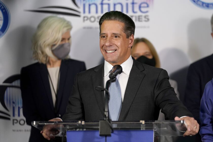 Miami-Dade County Public Schools Superintendent Alberto Carvalho announces at a news conference that wearing face masks to protect against COVID-19 will be optional in public schools, Tuesday, Nov. 9, 2021, in Miami. The new guidelines will go into effect Friday. (AP Photo/Lynne Sladky)