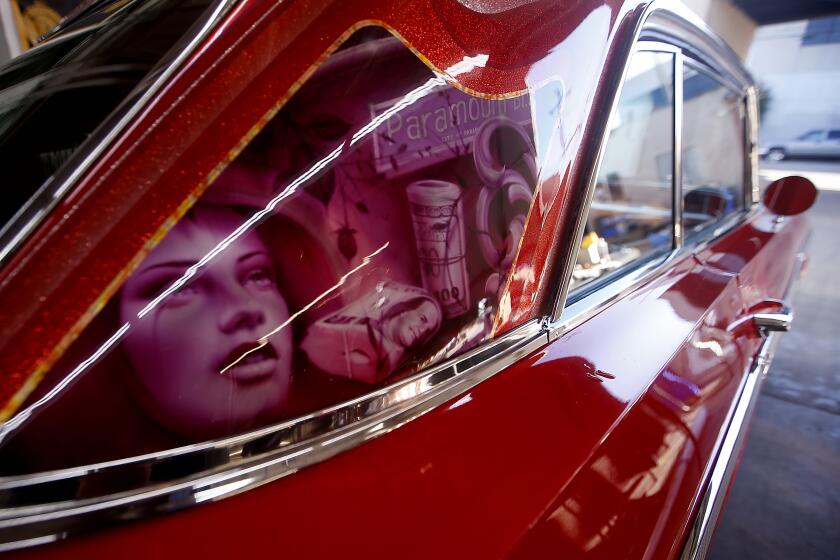 LONG BEACH, CALIF. - FEB. 1, 2023. A customized Chevrolet Impala at the shop of metal plating specilist Luis "Speedy" Rodriguez in Long Beach. (Luis Sinco / Los Angeles Times)