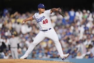 Dodgers reliever Brusdar Graterol pitches in the seventh inning Sunday  against the New York Yankees at Dodger Stadium.