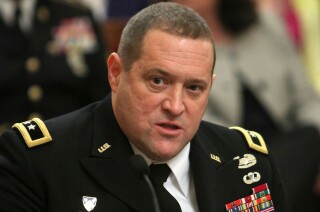 Adjutant General David Baldwin, Gov. Jerry Brown's appointee to head the California National Guard, responds to a question during his confirmation hearing before the Senate Rules Committee at the Capitol in Sacramento, Calif., Wednesday, Feb. 15, 2012. Baldwin has been tasked to take over a military agency that faces several challenges, including two separate criminal investigations involving alleged fraud and improper payments to service members, many high-level officers. (AP Photo/Rich Pedroncelli)