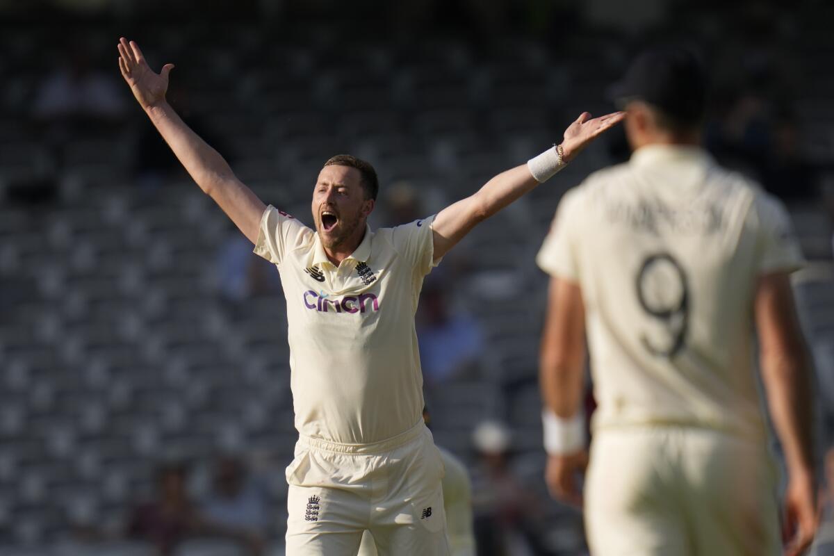 England's Ollie Robinson appeals for lbw the wicket of New Zealand's Kane Williamson during the fourth day of the Test match between England and New Zealand at Lord's cricket ground in London, Saturday, June 5, 2021. (AP Photo/Kirsty Wigglesworth)