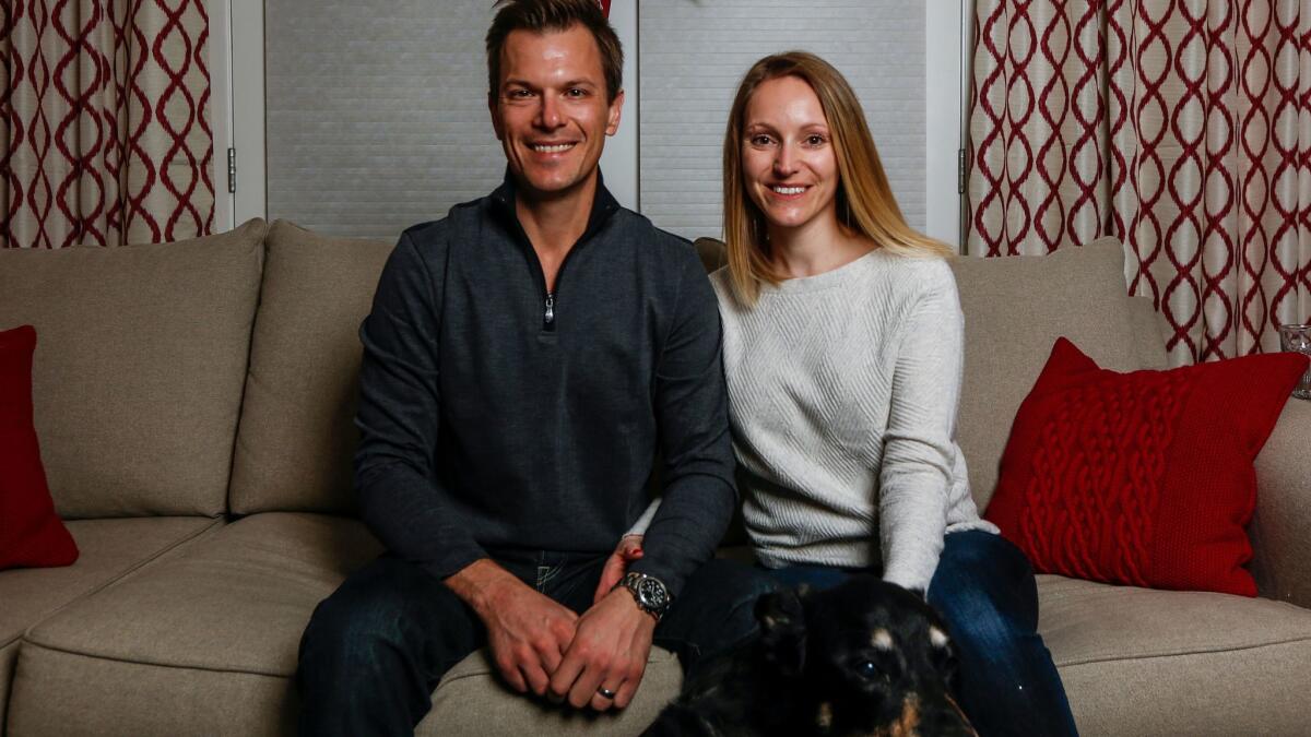 Married couple David Amejka, left, and Anett Seifert will get a big tax break under the final version of the tax plan.
