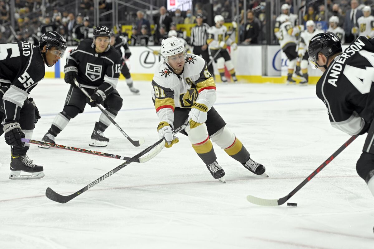 Vegas Golden Knights center Jonathan Marchessault (81) looks to block the puck against the Los Angeles Kings during the second period of an NHL preseason hockey game Friday, Oct. 1, 2021, in Las Vegas. (AP Photo/David Becker)