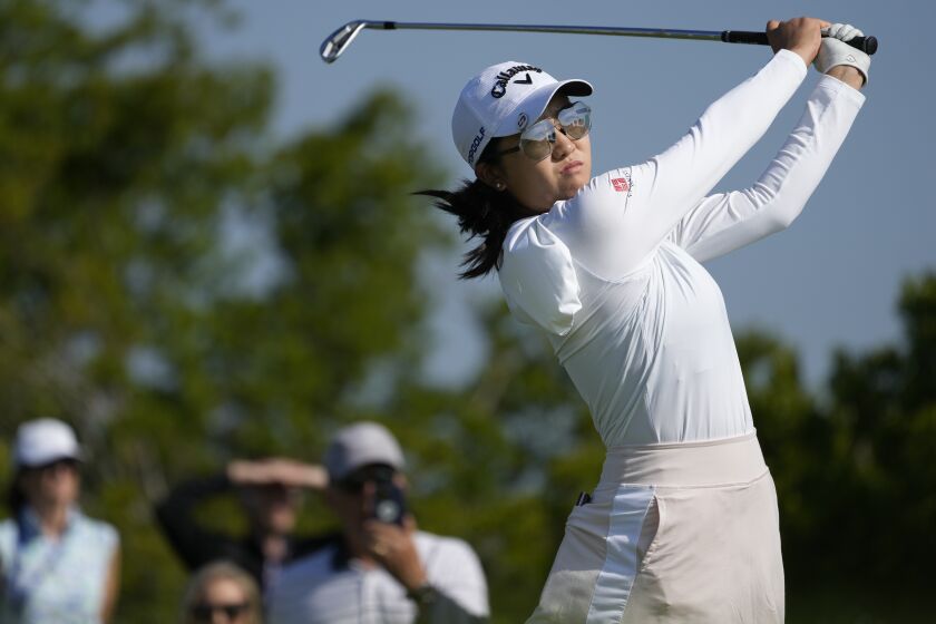 Rose Zhang hits off the second tee during the first round of the Mizuho Americas Open golf tournament, Thursday, June 1, 2023, at Liberty National Golf Course in Jersey City, N.J. (AP Photo/John Minchillo)