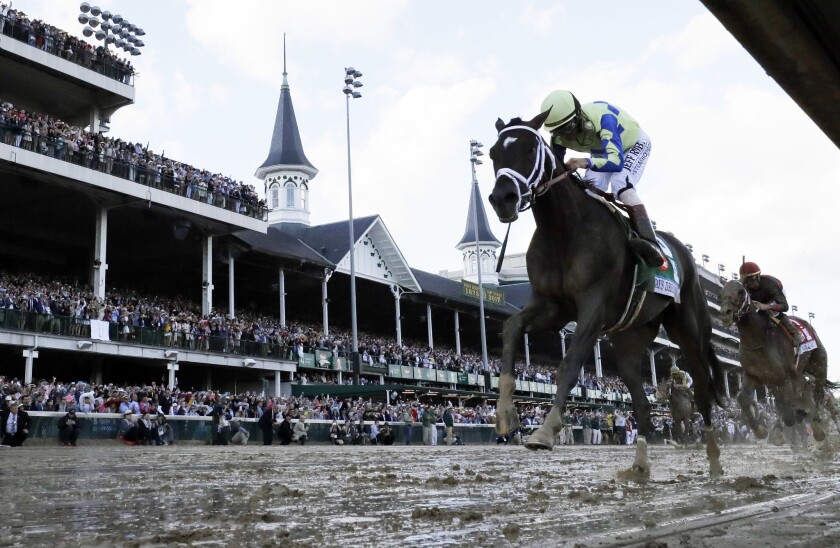 Always Dreaming, ridden by John Velazquez, heads down the home stretch to victory in the 143rd Kentucky Derby.