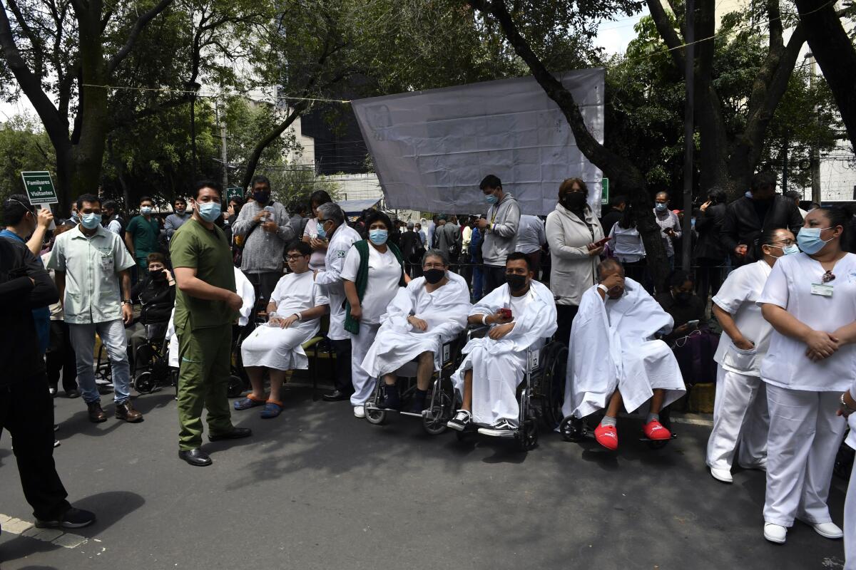 Patients outside a hospital after an earthquake in Mexico City.